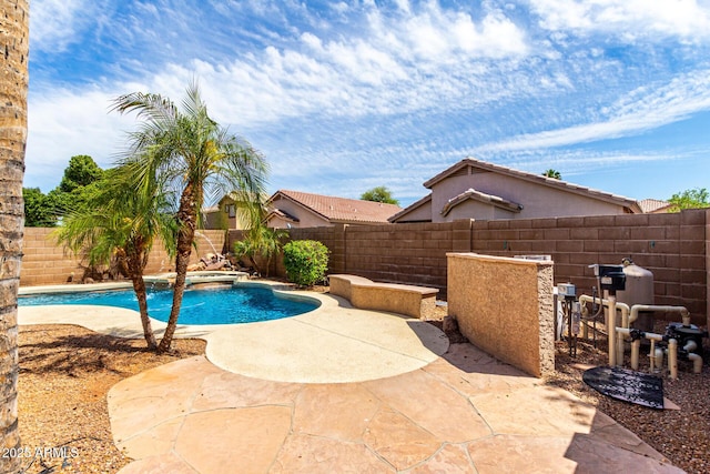 view of pool featuring a fenced in pool, a fenced backyard, and a patio area