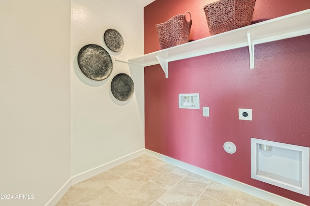 clothes washing area with electric dryer hookup and washer hookup