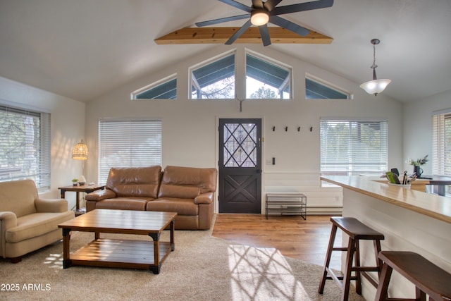 2273 Trail Cir, Overgaard, AZ 85933 - living room with a ceiling fan, healthy amount of natural light, light wood-style flooring, and wainscoting