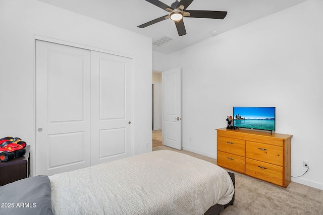 8140 E June St, Mesa, AZ 85207 - bedroom with light carpet, baseboards, visible vents, a closet, and ceiling fan