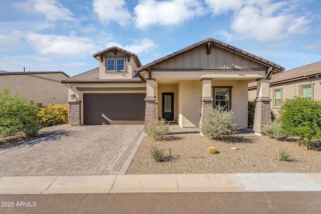 8140 E June St, Mesa, AZ 85207 - craftsman-style home with stucco siding, a tile roof, and decorative driveway