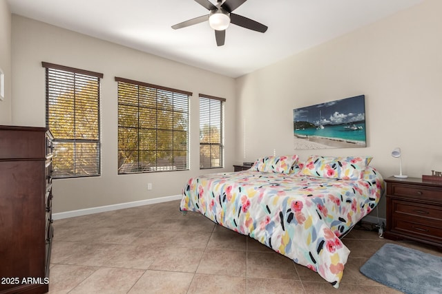 bedroom with light tile patterned flooring and ceiling fan