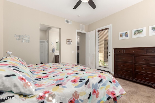 bedroom with ceiling fan, connected bathroom, and access to exterior