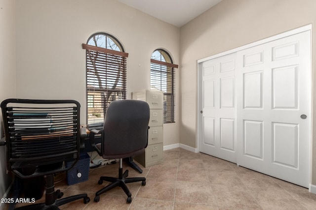 office area with light tile patterned floors