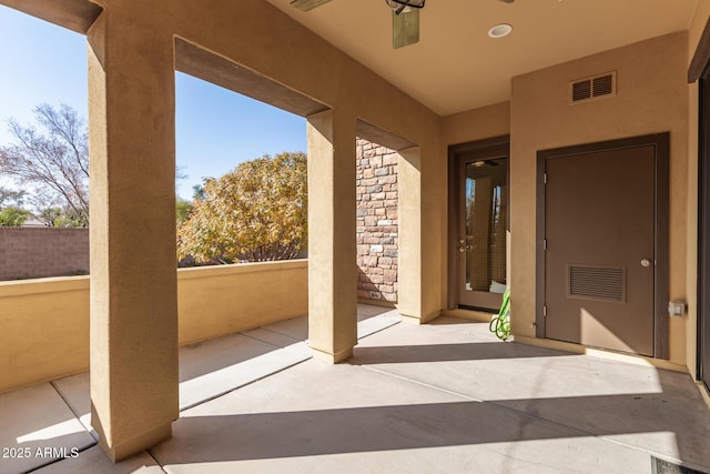 view of patio with ceiling fan