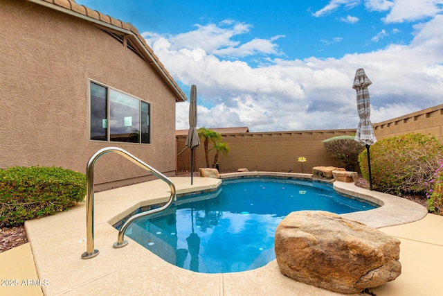 view of pool featuring a fenced in pool, a patio, and a fenced backyard