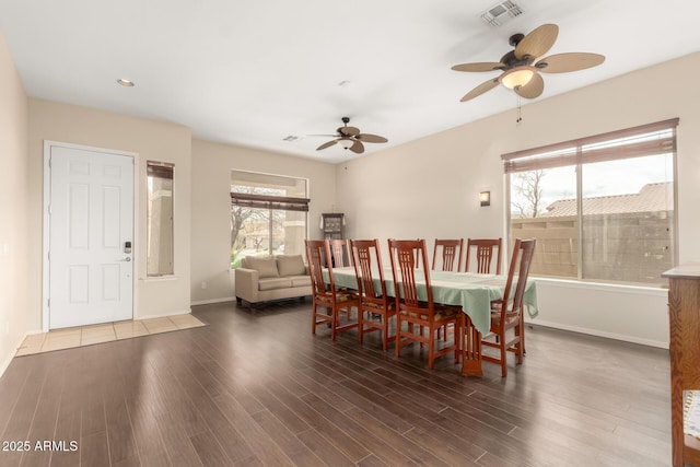 dining space featuring wood finished floors, baseboards, visible vents, recessed lighting, and ceiling fan