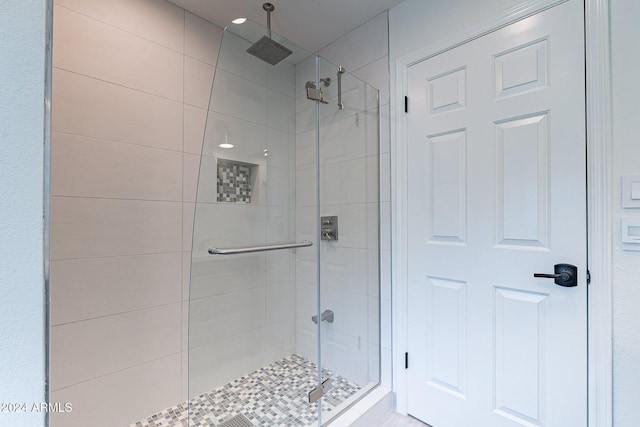 full bathroom with a stall shower