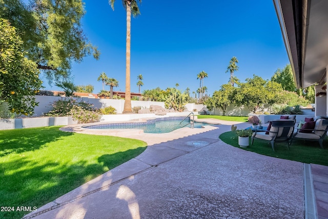 view of patio / terrace with a fenced in pool and a fenced backyard