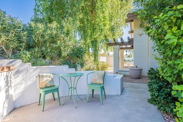 view of patio / terrace with fence