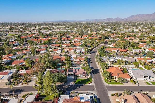 birds eye view of property with a residential view and a mountain view