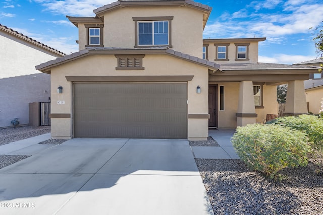 view of front of property with a garage