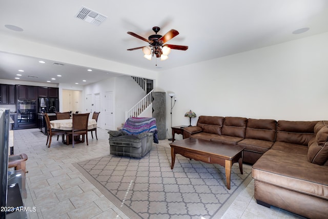 living room with ceiling fan