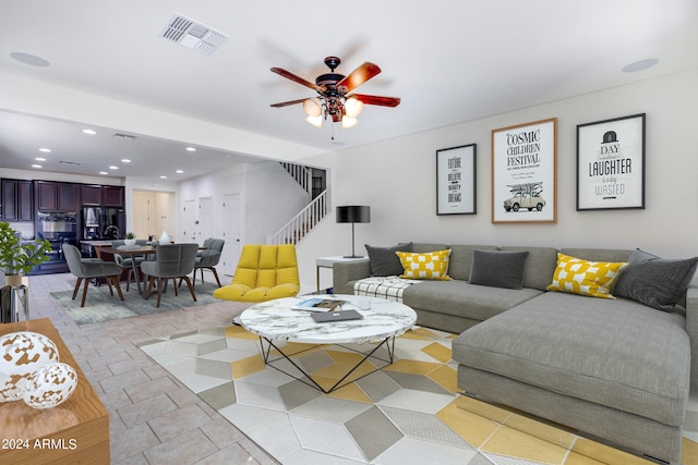 living room with ceiling fan