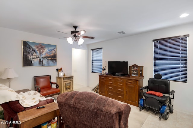 living room featuring ceiling fan