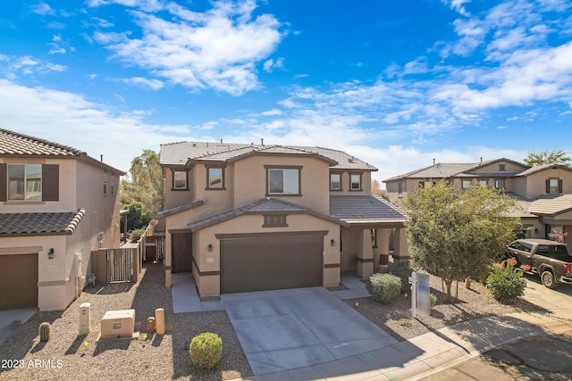 view of front of property with a garage