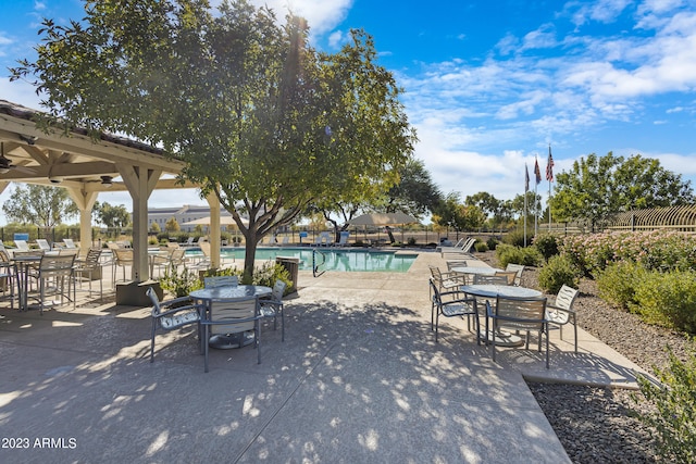 view of patio / terrace featuring a community pool