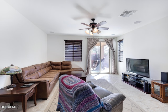 living room featuring ceiling fan