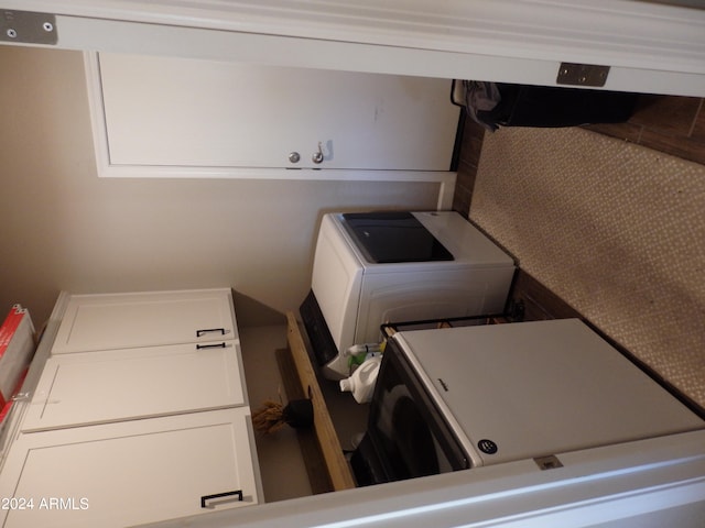 laundry room featuring washer / dryer