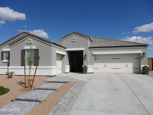 view of front of house with a garage