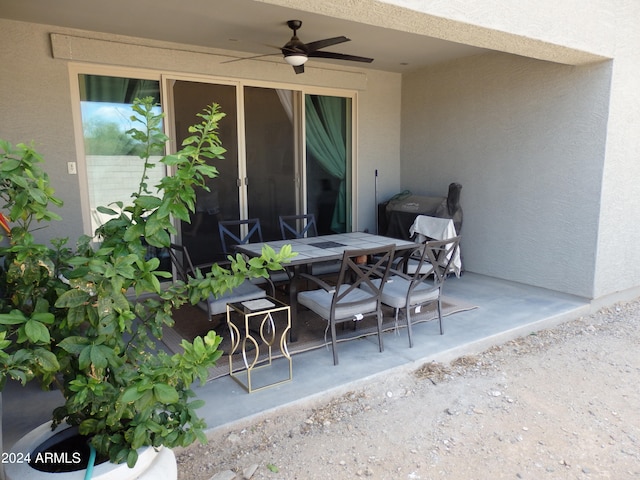 view of patio / terrace featuring ceiling fan