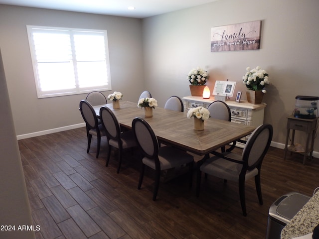 dining area featuring dark hardwood / wood-style flooring