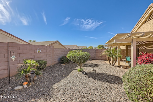 view of yard with a pergola