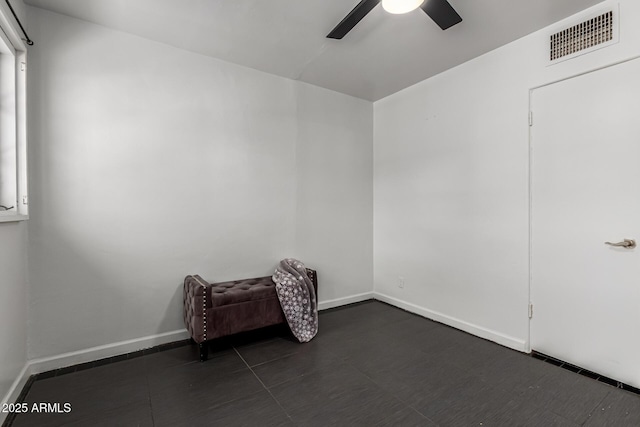 2941 N 19th Ave Unit 95, Phoenix, AZ 85015 - empty room with ceiling fan and baseboards