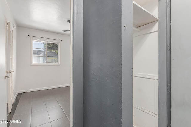 2941 N 19th Ave Unit 95, Phoenix, AZ 85015 - hall with tile patterned floors and baseboards