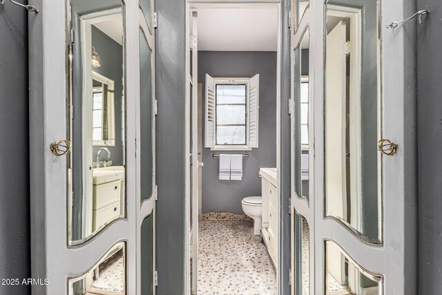 2941 N 19th Ave Unit 95, Phoenix, AZ 85015 - bathroom featuring vanity and speckle patterned floor