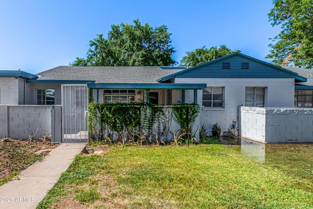 2941 N 19th Ave Unit 95, Phoenix, AZ 85015 - single story home featuring a gate and a shingled roof