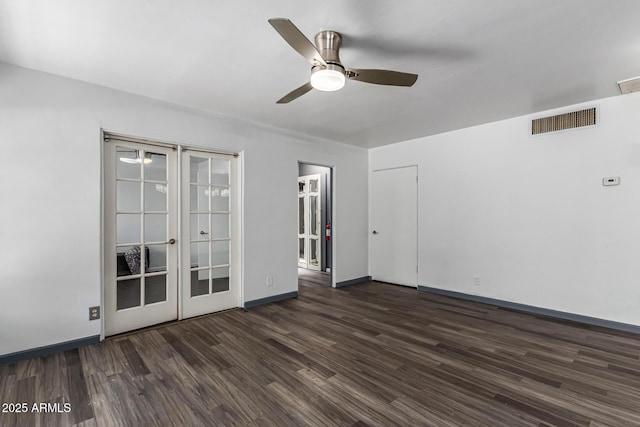 2941 N 19th Ave Unit 95, Phoenix, AZ 85015 - spare room featuring dark wood finished floors, french doors, and a ceiling fan