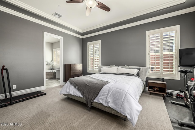 bedroom with visible vents, ensuite bathroom, carpet flooring, crown molding, and baseboards