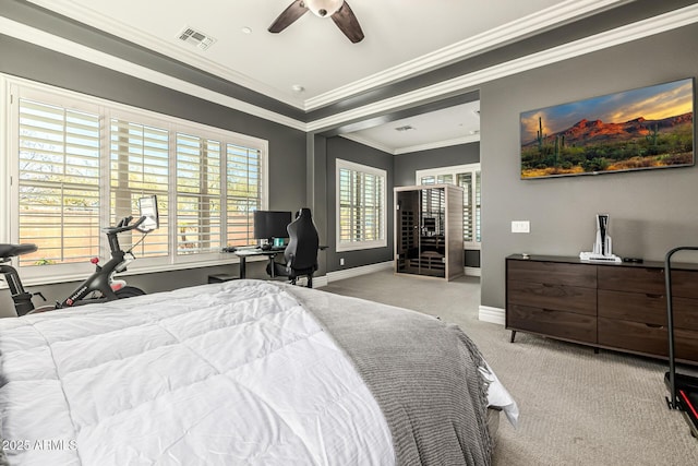 bedroom featuring visible vents, ornamental molding, carpet flooring, baseboards, and ceiling fan