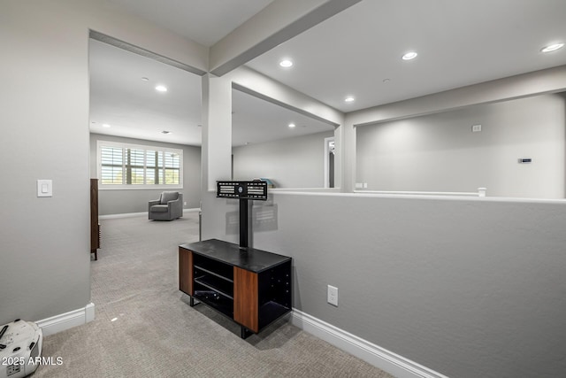 interior space with carpet flooring, recessed lighting, and baseboards