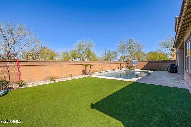 view of yard featuring a patio, a fenced backyard, and a fenced in pool