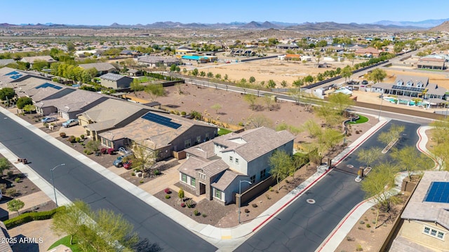 birds eye view of property featuring a residential view and a mountain view