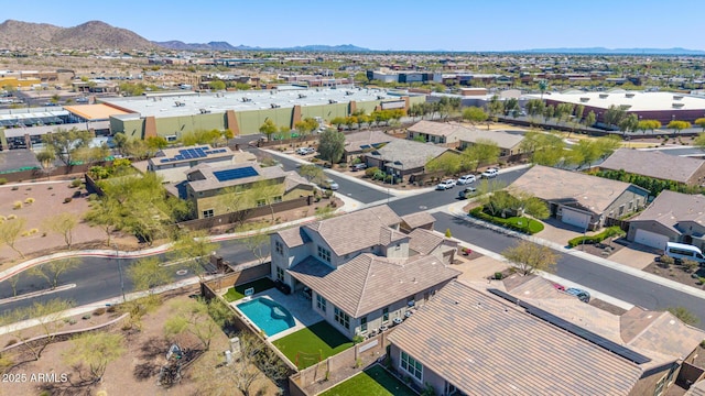 aerial view with a mountain view and a residential view