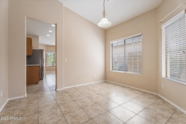 40614 N Key Ln, Anthem, AZ 85086 - empty room featuring light tile patterned flooring and recessed lighting