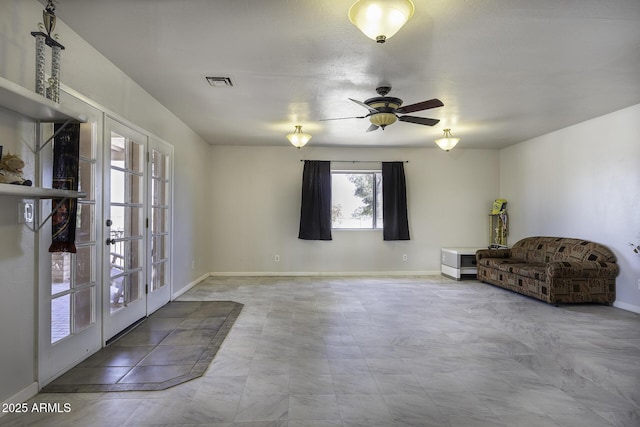 14484 W Jimmie Kerr Blvd, Casa Grande, AZ 85122 - living room featuring baseboards, ceiling fan, and french doors