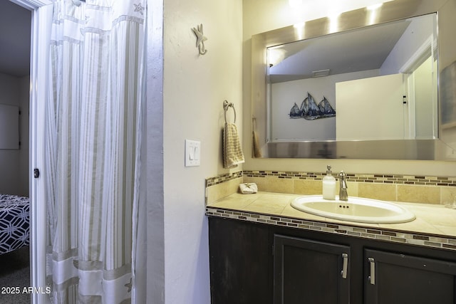 14484 W Jimmie Kerr Blvd, Casa Grande, AZ 85122 - bathroom featuring vanity and decorative backsplash