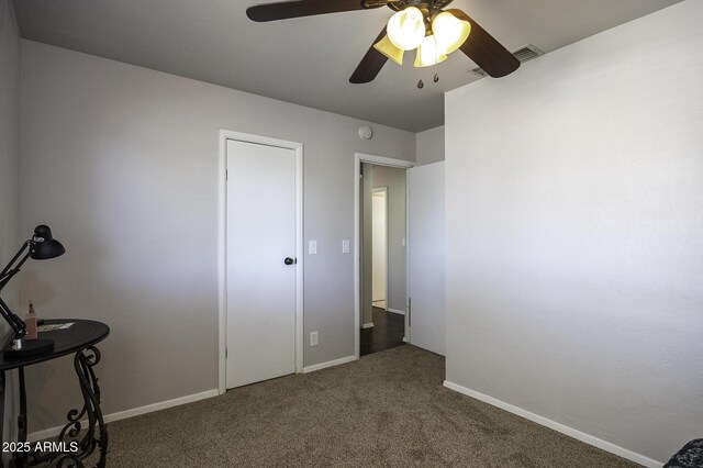 14484 W Jimmie Kerr Blvd, Casa Grande, AZ 85122 - carpeted bedroom with baseboards and ceiling fan