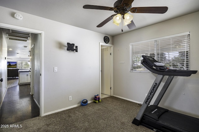 14484 W Jimmie Kerr Blvd, Casa Grande, AZ 85122 - exercise room with plenty of natural light, a ceiling fan, baseboards, and dark carpet