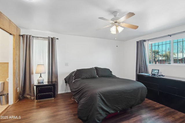 bedroom featuring dark wood-type flooring and ceiling fan