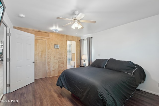 bedroom featuring ceiling fan and dark hardwood / wood-style flooring