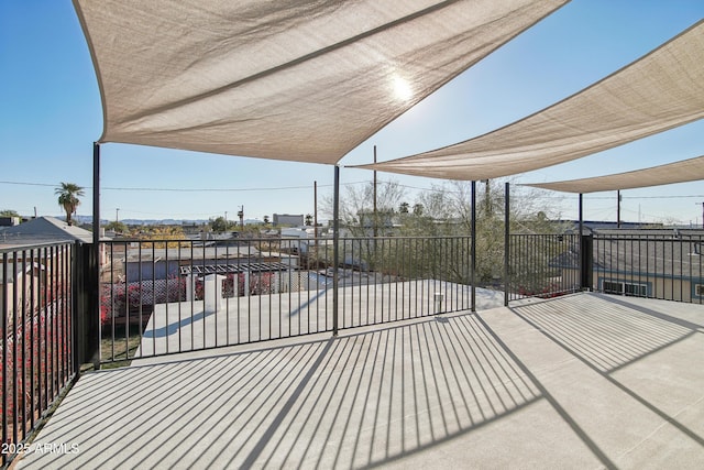 view of patio / terrace with a balcony