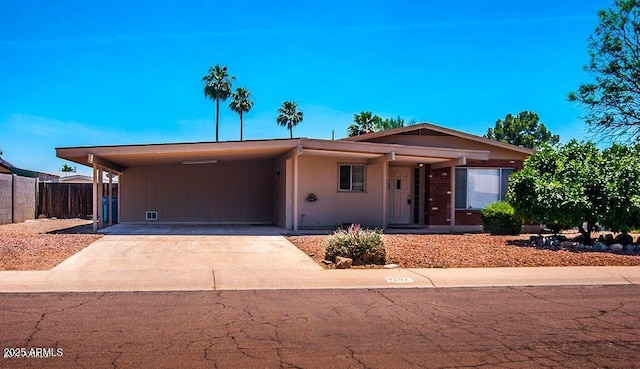 view of front of house featuring a carport