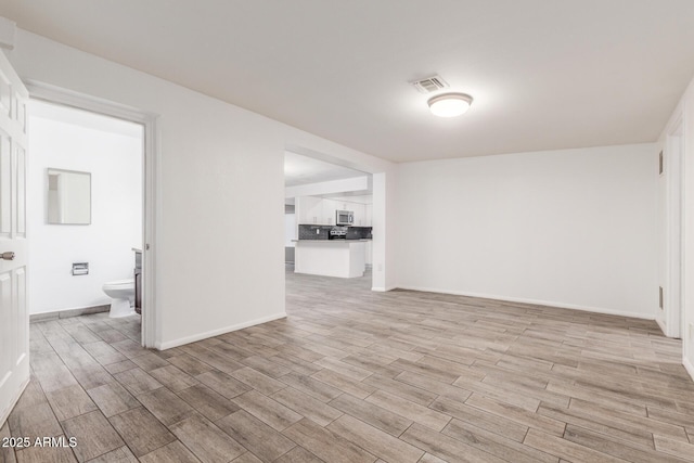 empty room featuring light hardwood / wood-style flooring