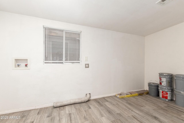 laundry room with hookup for a washing machine and light wood-type flooring