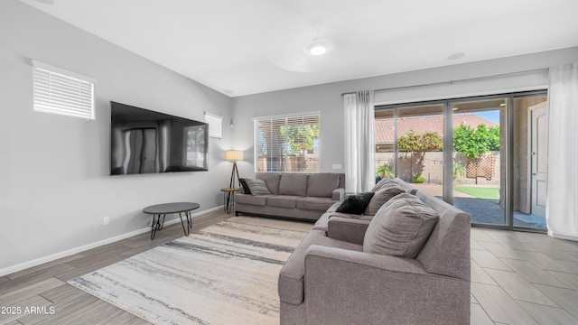 living room featuring baseboards